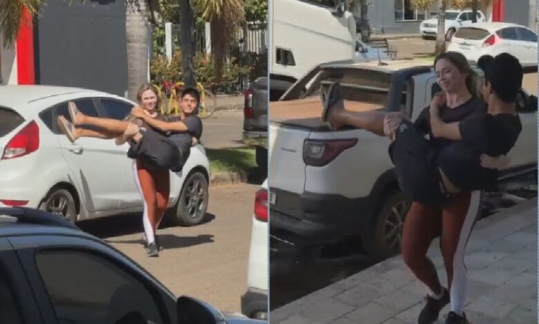 Cena curiosa em Iporá: mulher carrega marido no colo após lesão no pé